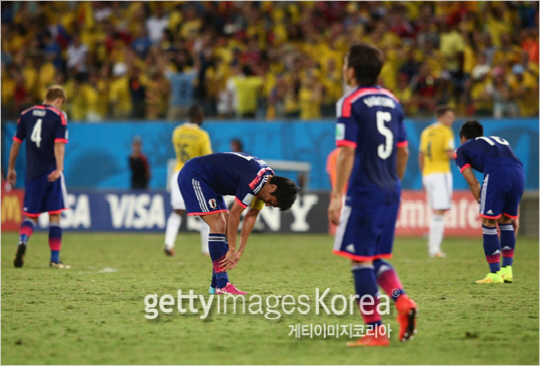 콜롬비아에게1-4로완패한뒤실망스러워하는일본축구대표선수들.(사진=Gettyimages/멀티비츠)