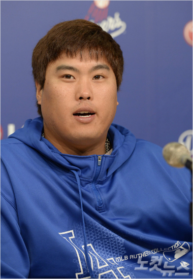 '빨리올게요'14일(한국시각)애틀랜타전에서입은엉덩이부상으로부상자명단등재가결정된LA다저스류현진.(자료사진)