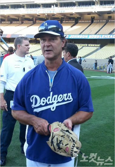 '휴,내년까지는버티겠네'올시즌세인트루이스와내셔널리그디비전시리즈에서패퇴해2년연속월드시리즈진출에실패했으나신임을받은LA다저스돈매팅리감독.(자료사진)