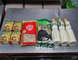 ▲유통기한경과식품(누룽지외3종류).<부산시제공>