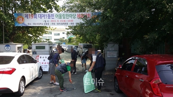 ▲강서구지역축제에사회봉사대상자들이축제지원활동을벌이고있다.(사진제공=부산보호관찰소)