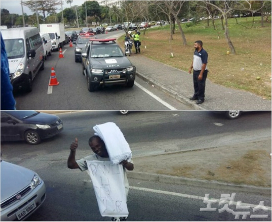 '브라질,따봉!'브라질경찰들이올림픽관련차량만이운행이가능하도록차로를통제하는모습(위)과도로에서물건을파는브라질시민이취재진을향해포즈를취한모습.(리우=노컷뉴스)