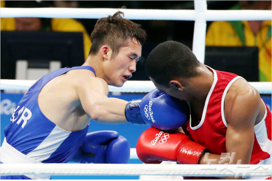 복싱밴텀급의함상명은라이벌인중국의장지아웨이와16강전에서맞붙는다(올림픽사진공동취재단).