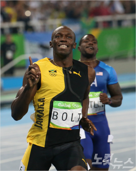 우사인볼트(사진왼쪽)와저스틴개틀린(올림픽사진공동취재단)