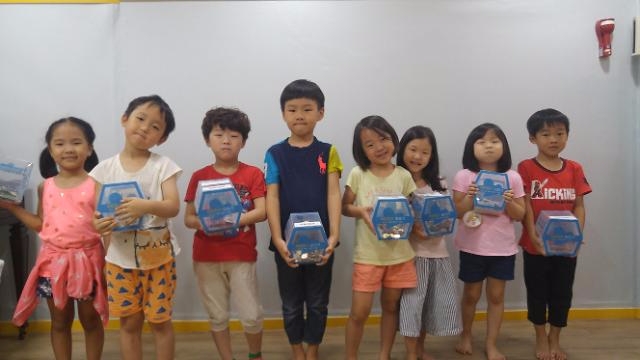 강남구 어린이들, '잠자는 동전' 모아 1200만원 기부
