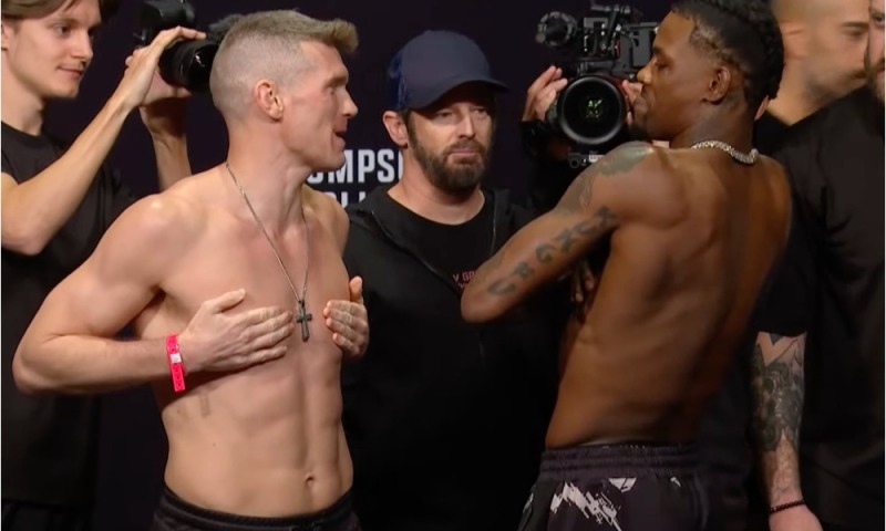 계체후 미디어데이에서 신경전을 벌이는 톰슨(왼쪽)과 홀랜드(사진=UFC)