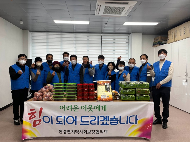 무안군 현경면 지역사회보장협의체가 어려웃 이웃을 위해 사랑의 반찬 나눔 봉사활동을 펼쳤다 (사진제공 = 무안군)