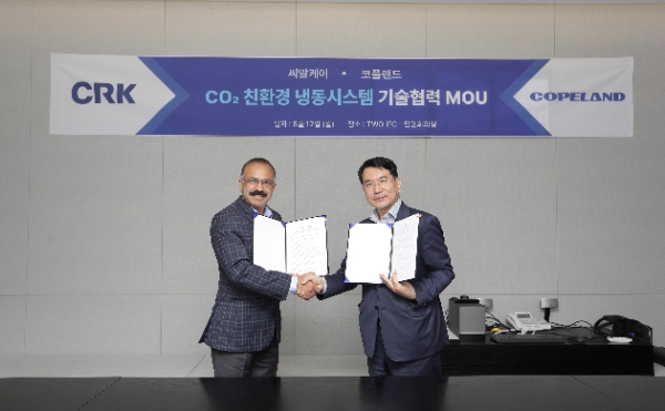 구자익(오른쪽) CRK대표와 Sandeep Nair 코플랜드 AMEA 사장