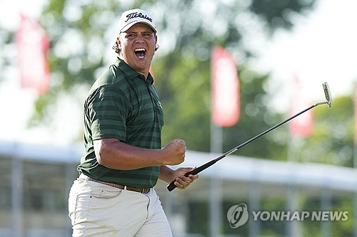 우승 퍼트를 넣고 환호하는 포트기터. / 사진=연합뉴스