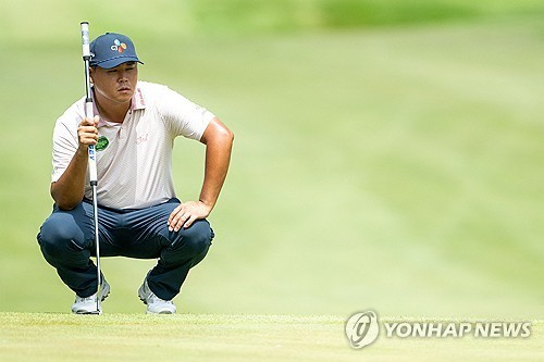 그린을 읽는 김시우. / 사진=연합뉴스