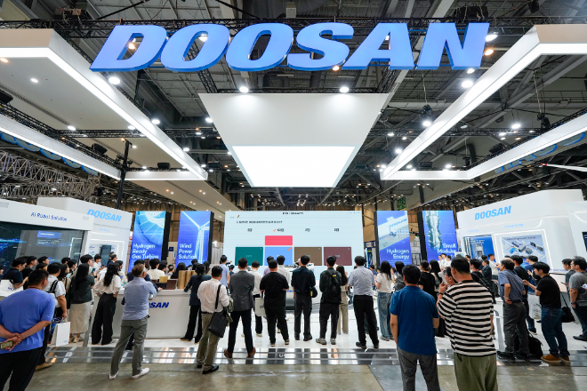 27일 부산 해운대구 벡스코 '기후산업국제박람회(WCE) 2025' 행사장에 마련된 두산 통합 전시관 ⓒ두산