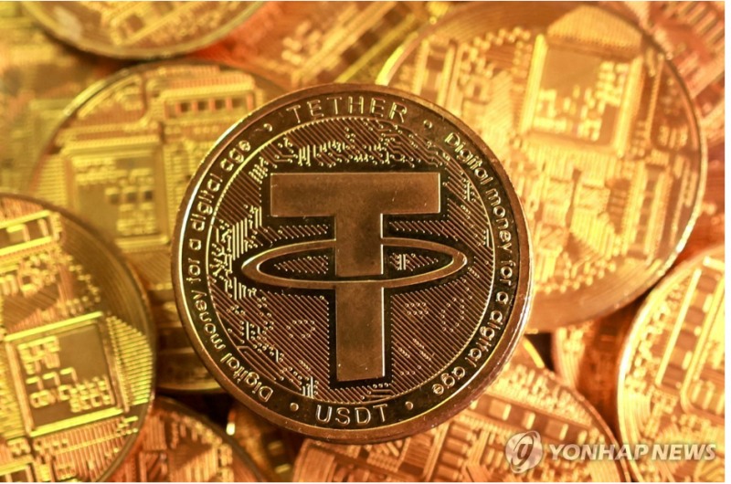 지난해 스테이블 코인 거래액이 33조달러로 역대 최고치를 기록했다. 사진=테더 USDT 모형, 로이터통신, 연합뉴스