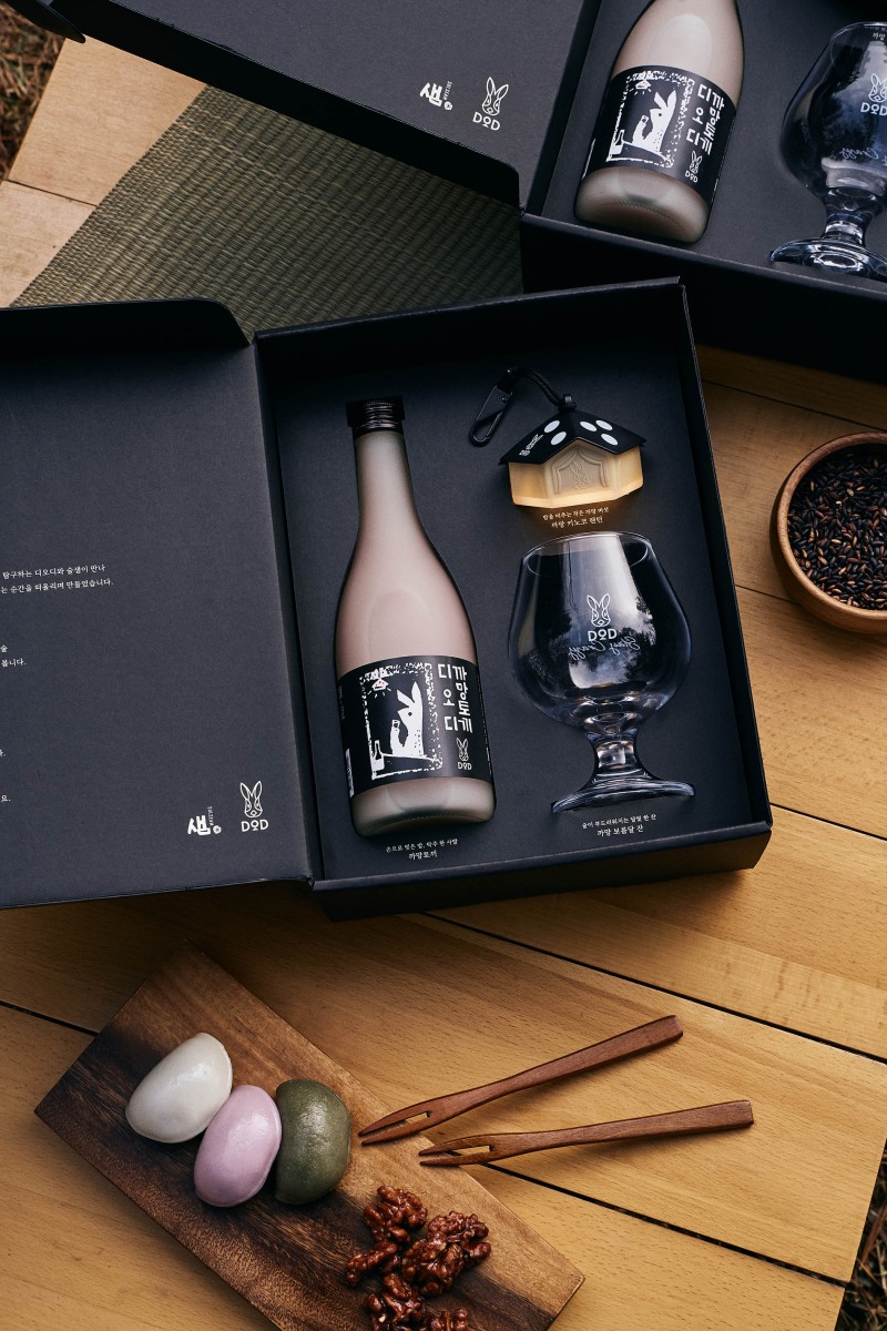 캠핑 라이프스타일 브랜드 디오디, 전통주 술샘과 협업 ‘디오디 까망토끼 에디션’ 출시