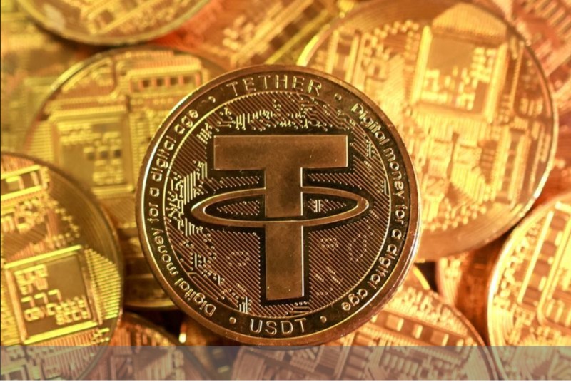 세계 최대 스테이블코인 USDT 발행사인 테더가 26일(현지시간) 지난 4분기 27톤에 달하는 금을 추가 매입했다고 밝혔다.사진=로이터통신, 연합뉴스